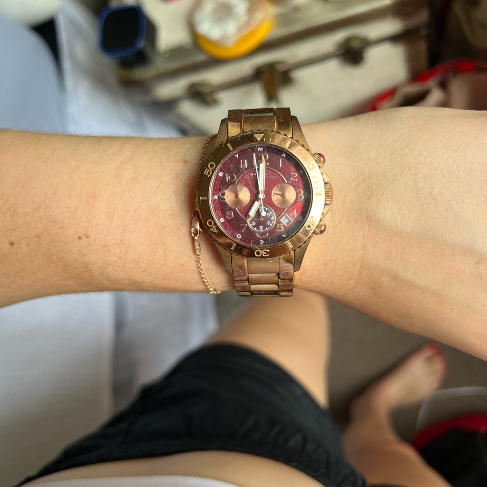 Rose gold Marc by Marc Jacobs watch with a rose red pink face